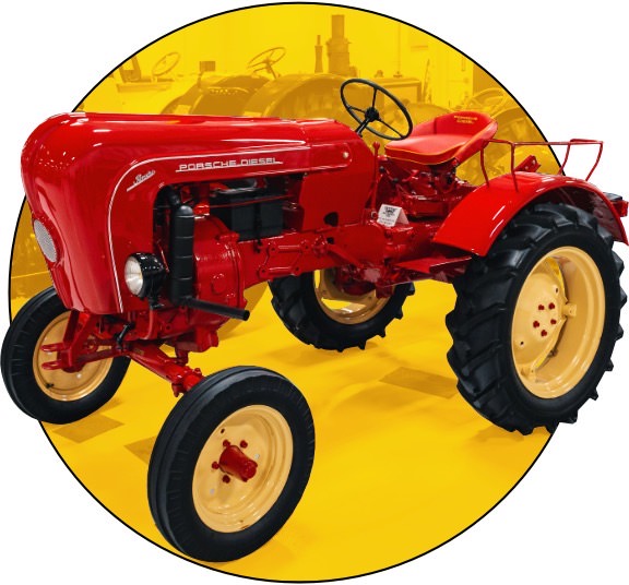 Old restored diesel tractor built by Porsche